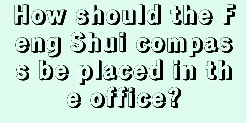 How should the Feng Shui compass be placed in the office?